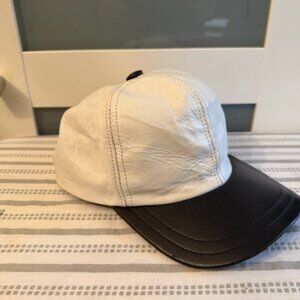 White leather baseball cap with black